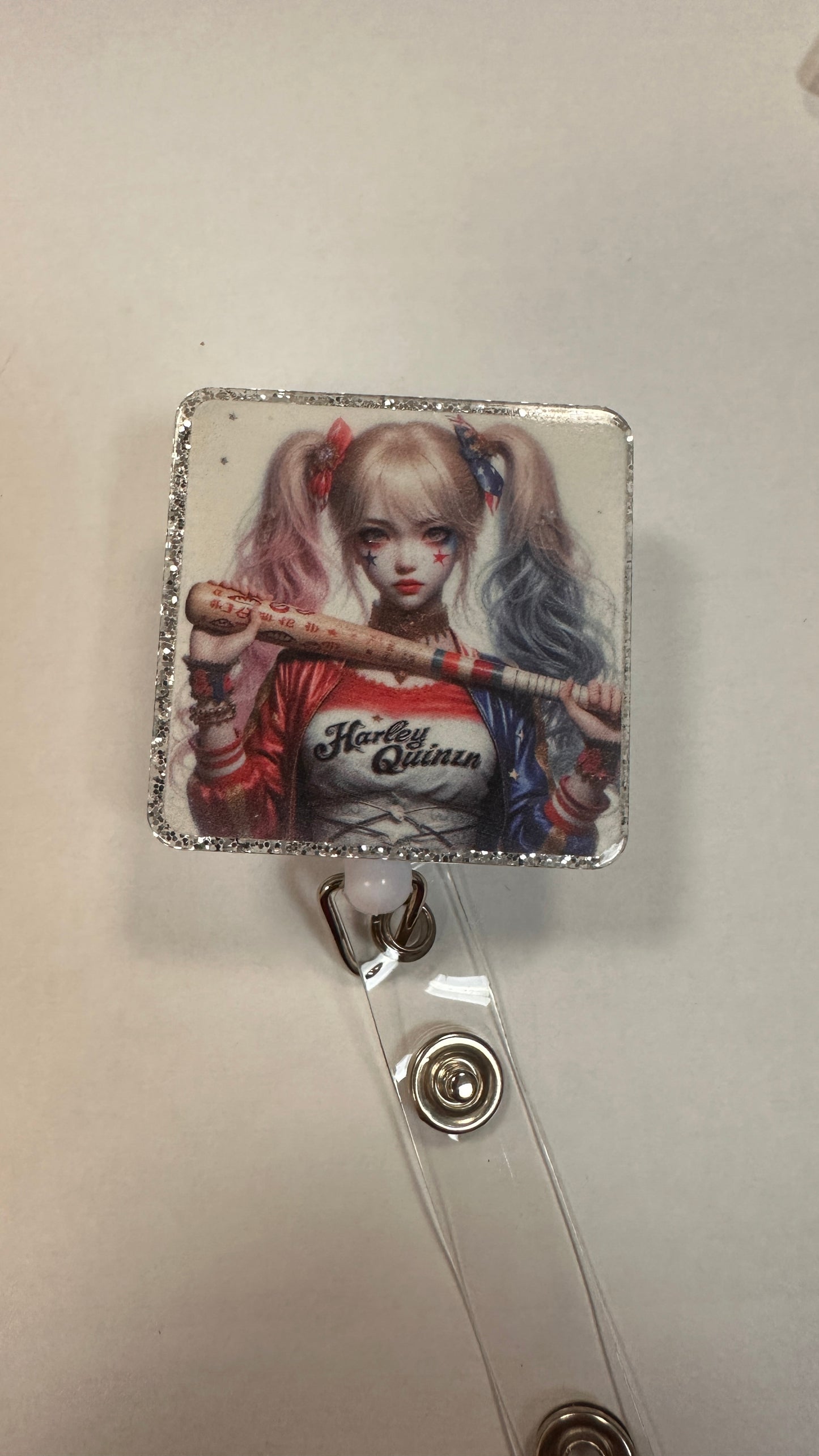 Harley Q badge reel