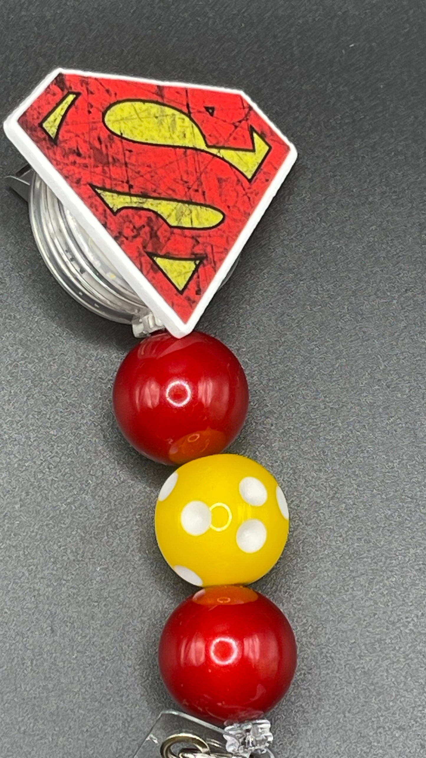 Super guy badge reel. Retractable with an alligator