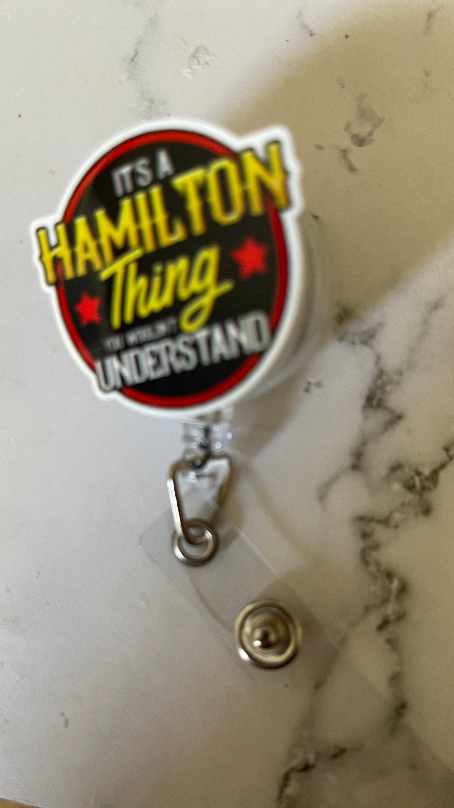It’s a Hamilton thing badge reel. Nurses, teachers, anyone who wears a badge!