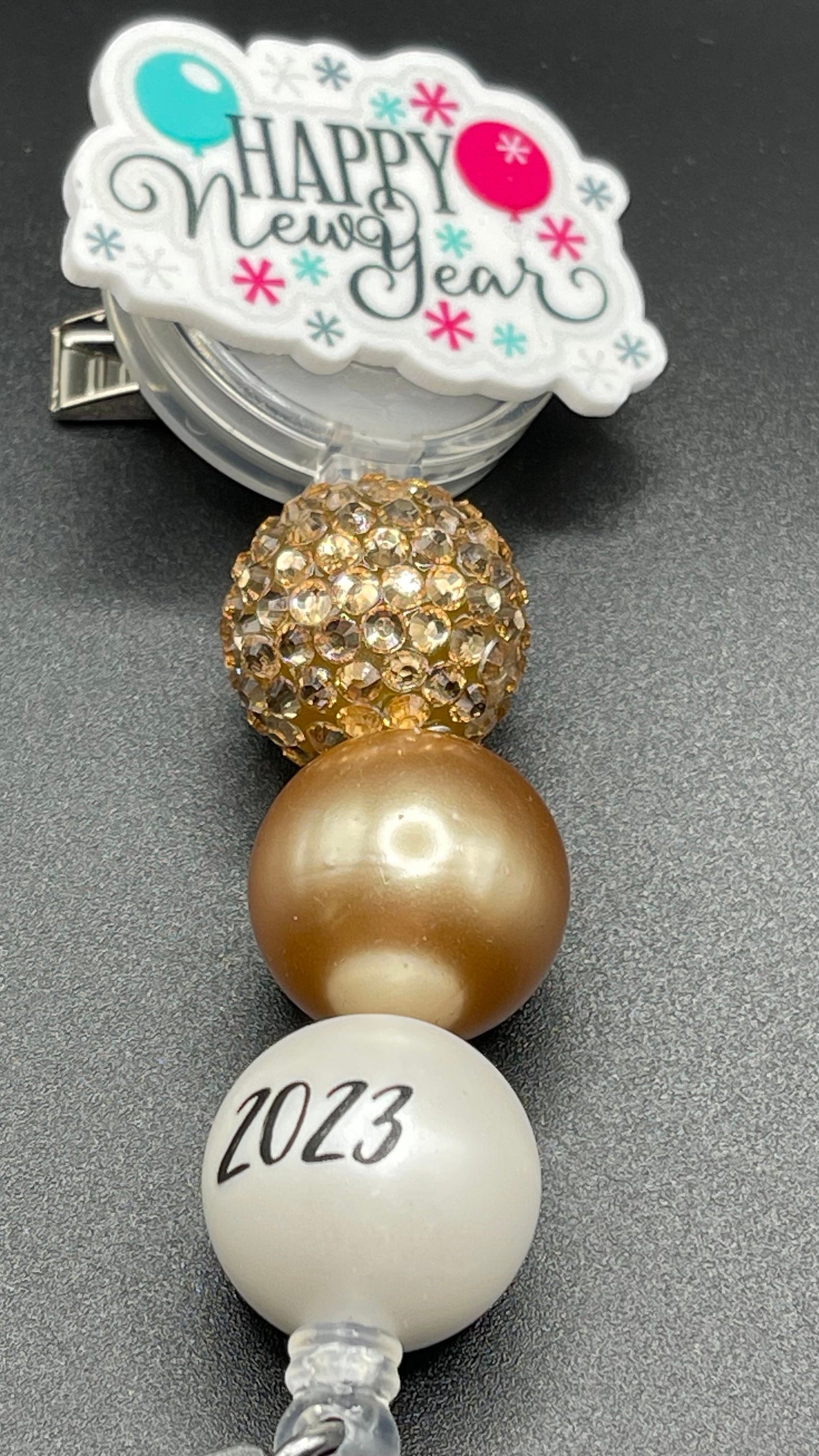New Years beaded Festive Badge Reel is cute and unique! Retractable with an alligator clip