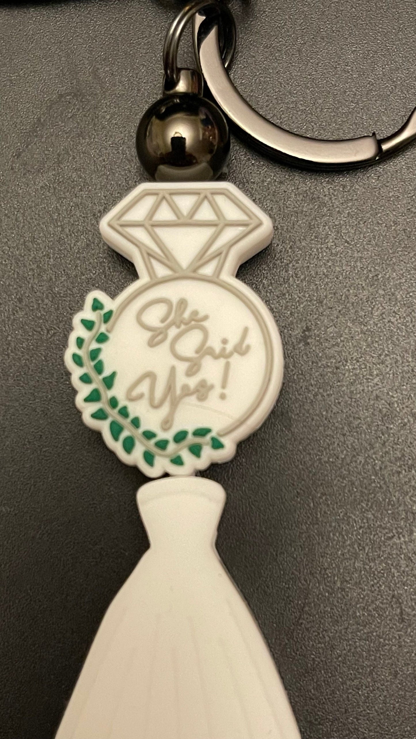 She said yes! Bridal dress keychain or zipper pull. Also can put on purses or backpacks or any bag!