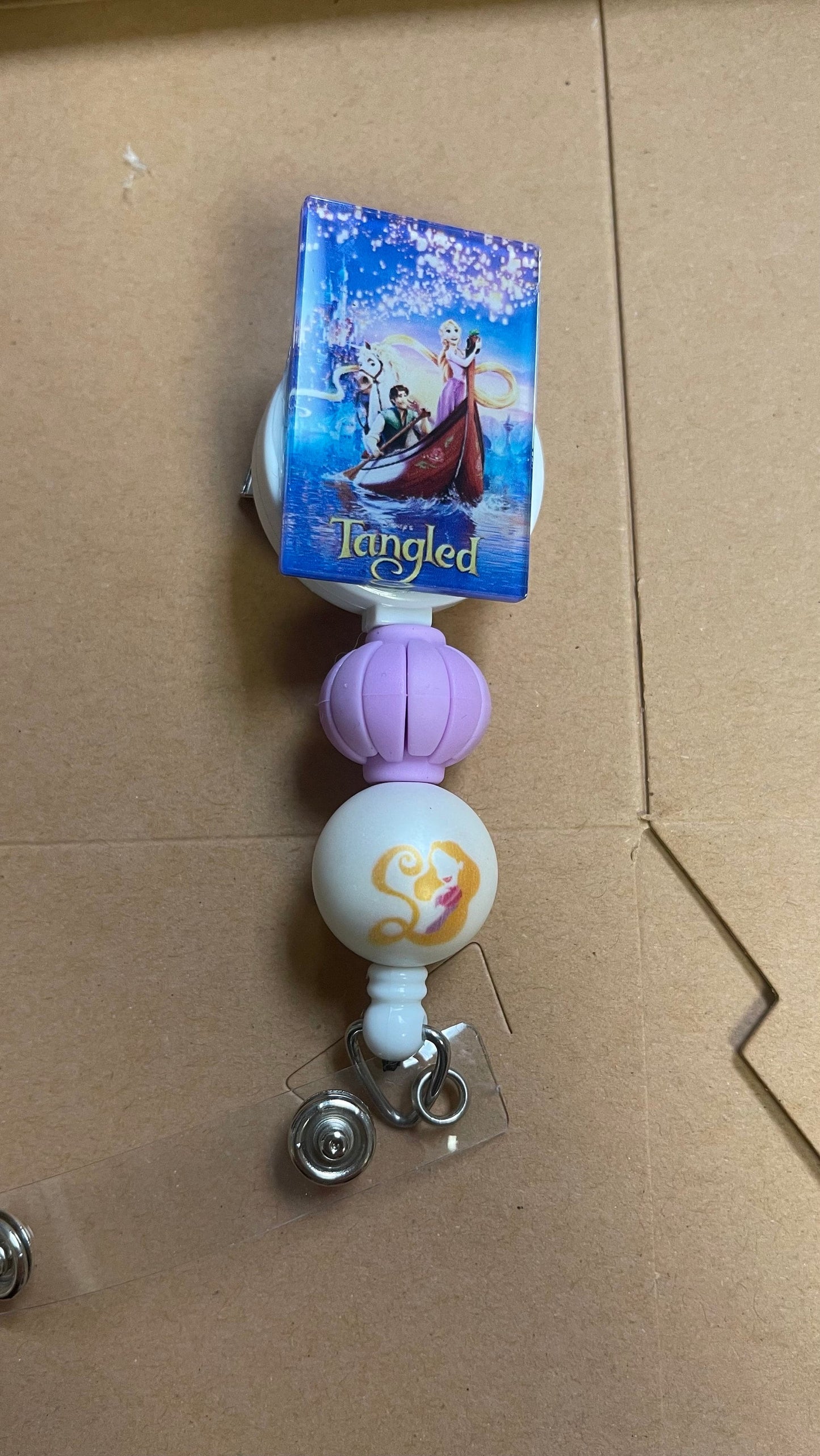 Rapunzel beaded badge reel! Movie Poster badge reel