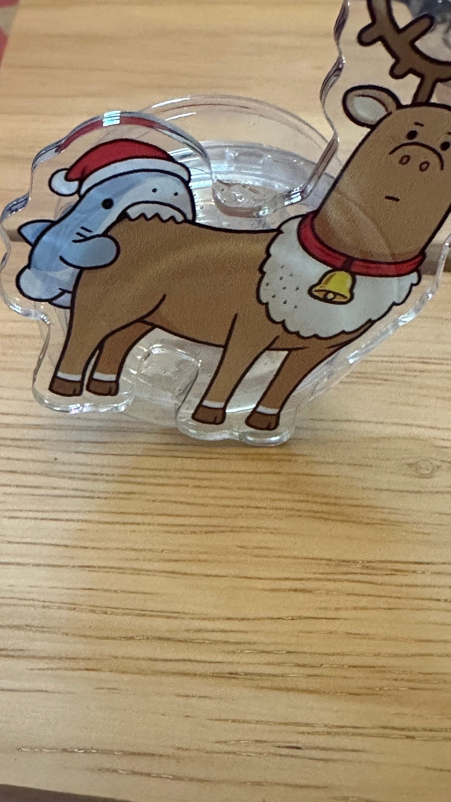 Baby shark biting a reindeer Phone Grip, funny phone stand