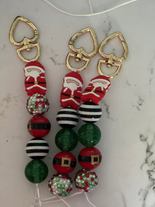 Santa keychain or zipper pull. Also can put on purses or backpacks or any bag!