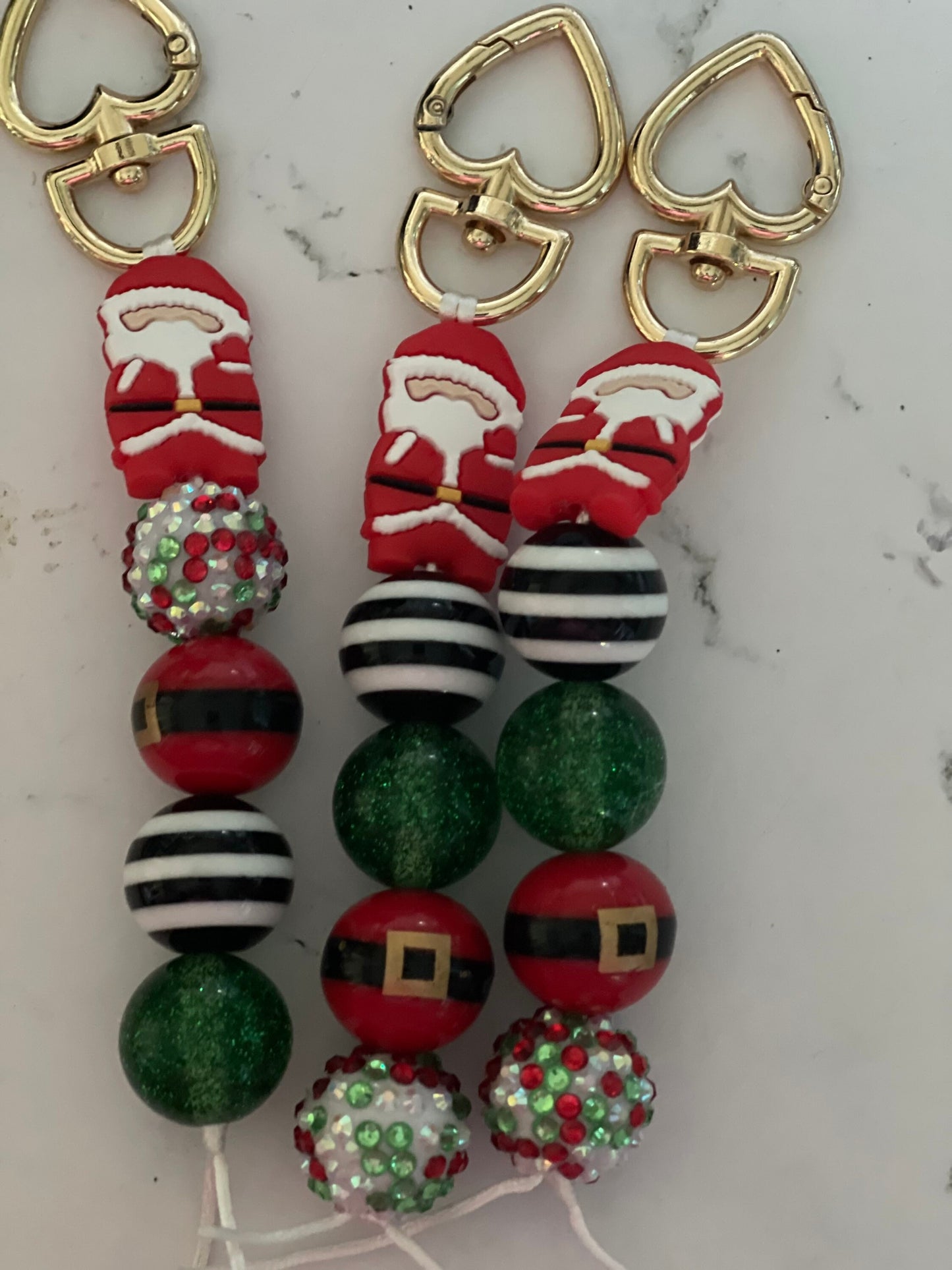 Santa keychain or zipper pull. Also can put on purses or backpacks or any bag!