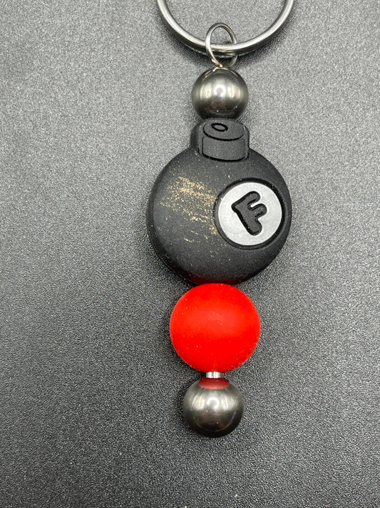 F bomb keychain or zipper pull. Also can put on purses or backpacks or any bag!