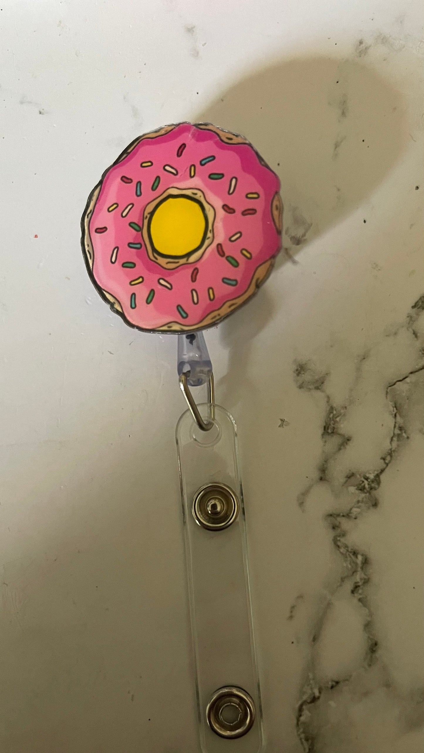 Pink donut retractable badge reel. Nurse badge, teacher badge, vet tech, doctors, warehouse workers