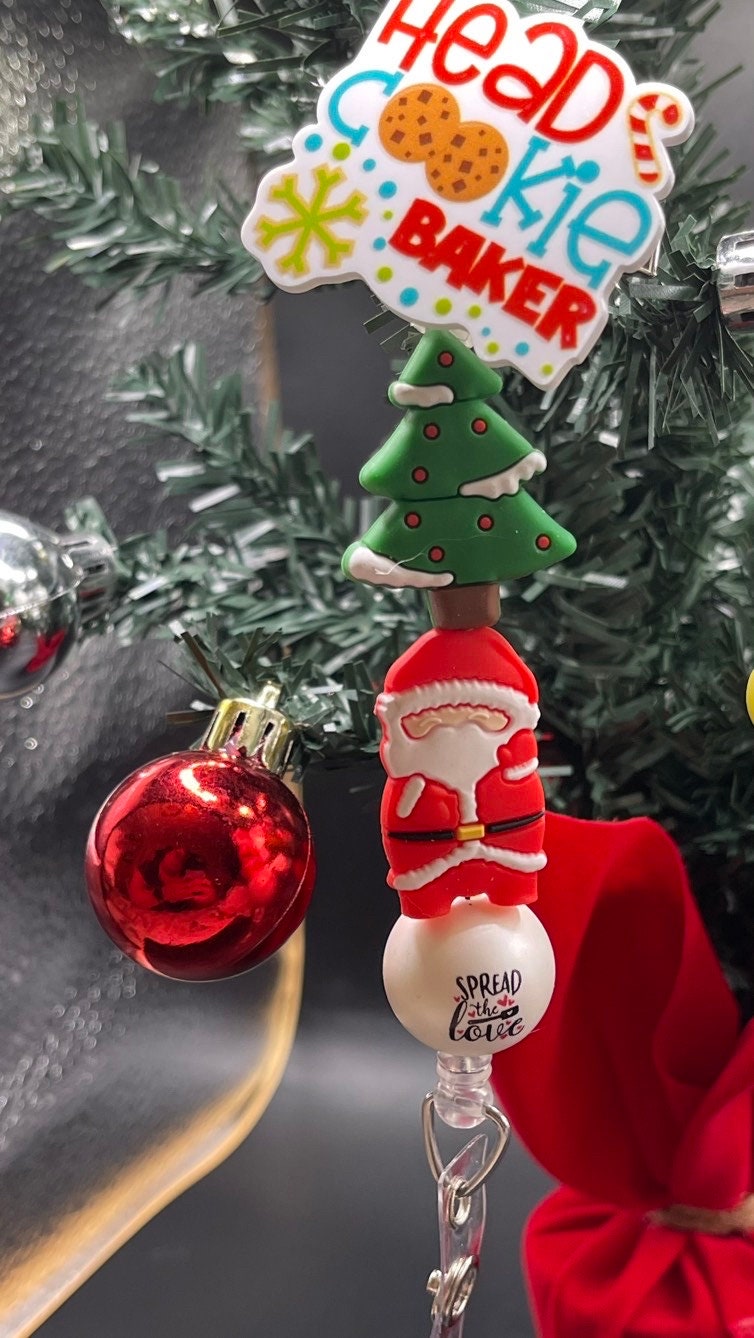 Christmas, head cookie baker badge reel. Retractable with an alligator clip