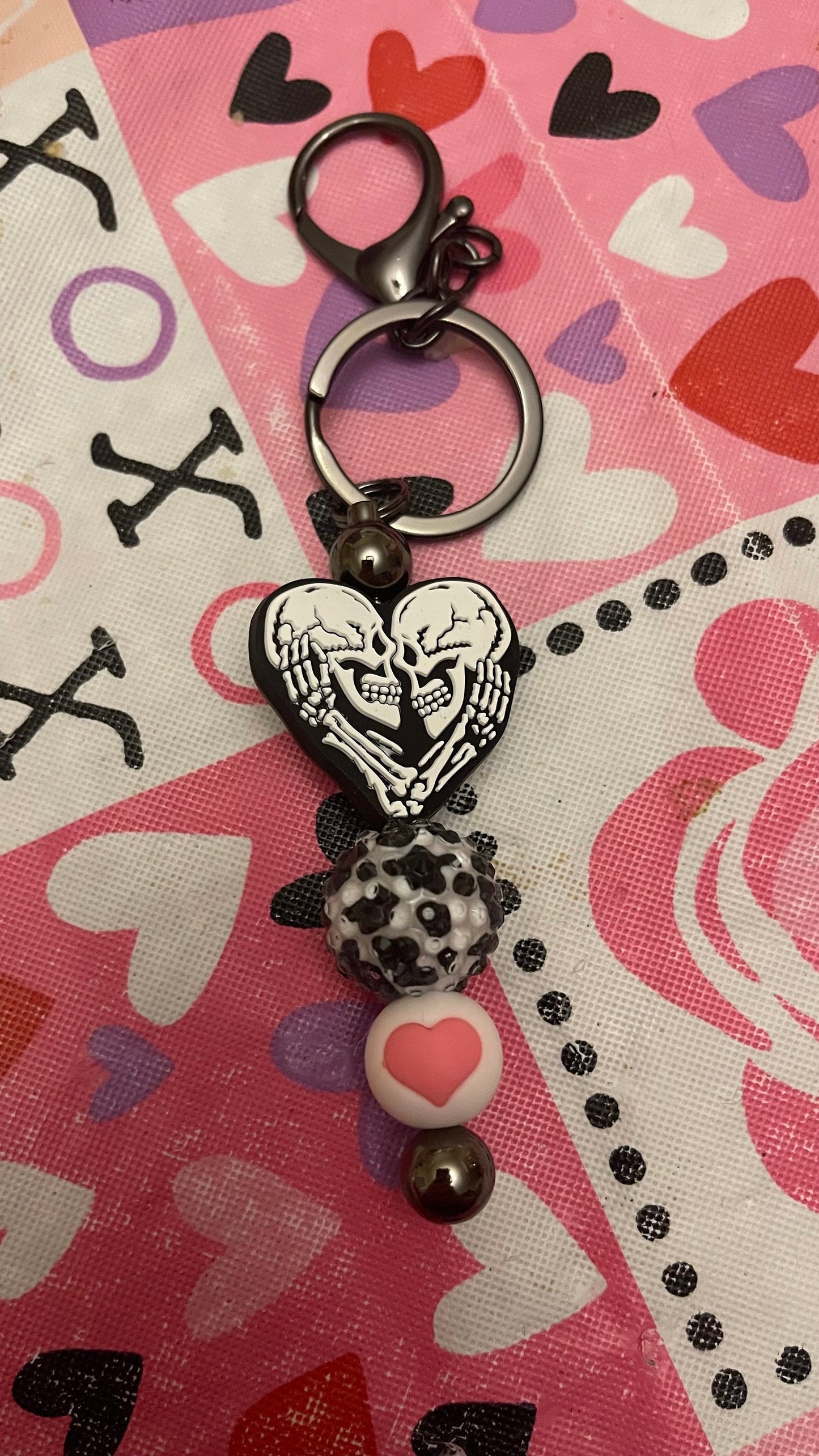 Skeleton love keychain or zipper pull. Also can put on purses or backpacks or any bag!