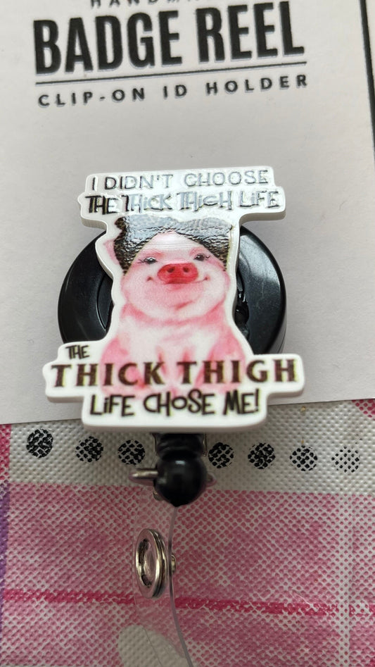 Thick thigh life badge reel