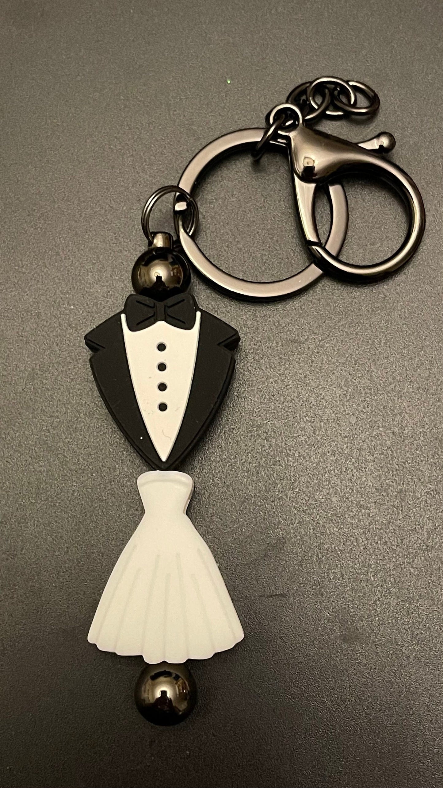 Wedding dress and tux keychain or zipper pull. Also can put on purses or backpacks or any bag!