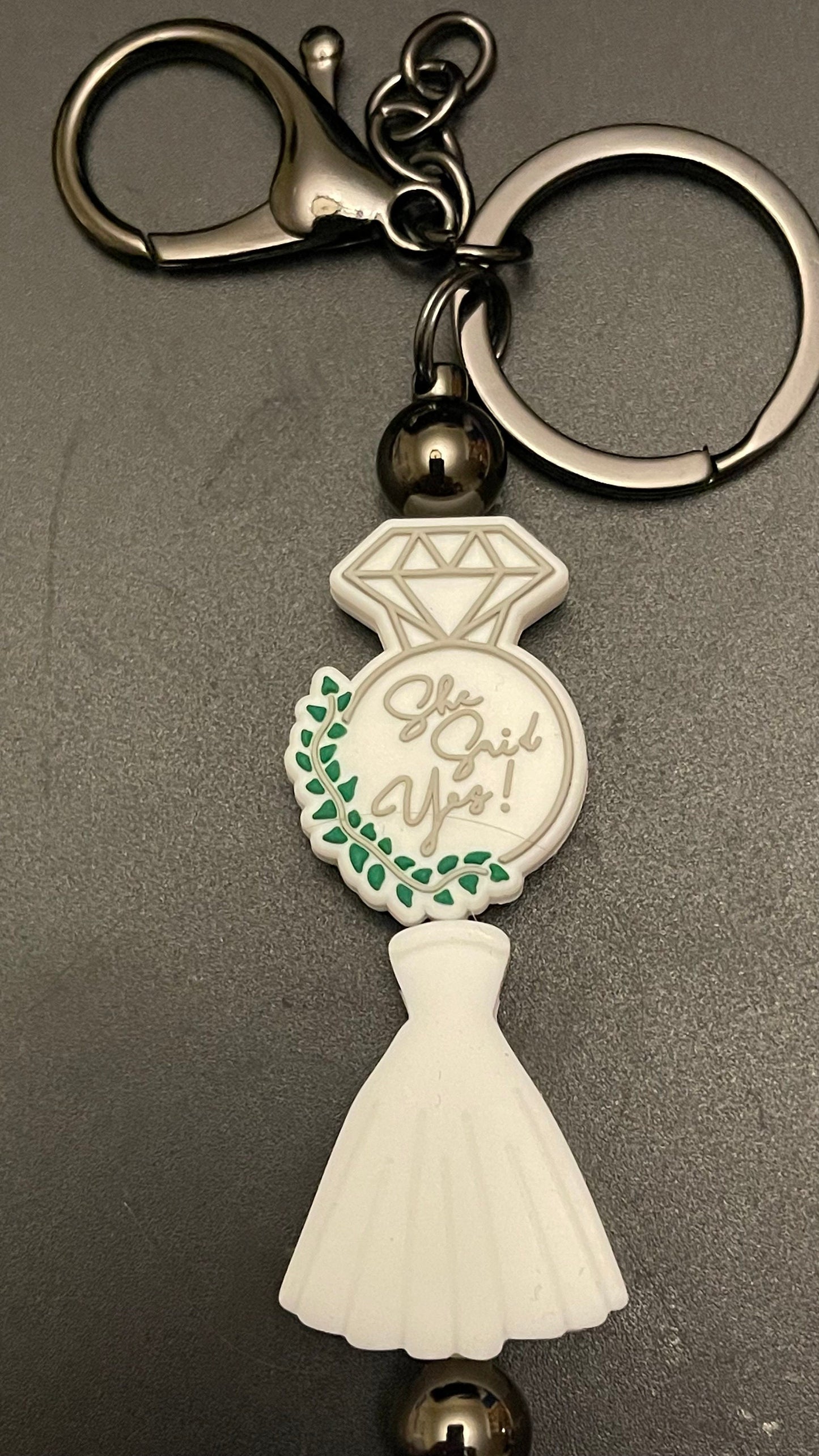 She said yes!  Bridal dress keychain or zipper pull. Also can put on purses or backpacks or any bag!