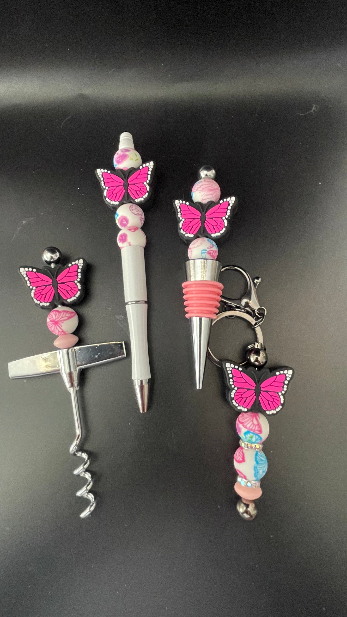 Pink Monarch silicone butterfly gift set. Wine opener and closer, pen and keychain