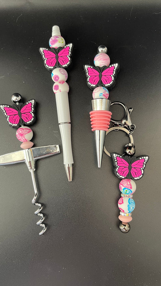 Pink Monarch silicone butterfly gift set. Wine opener and closer, pen and keychain